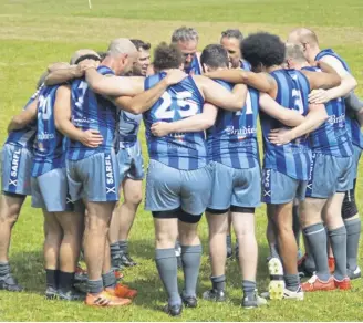  ?? ?? The Kingdom Kangaroos huddle at half time during one of their matches in 2022