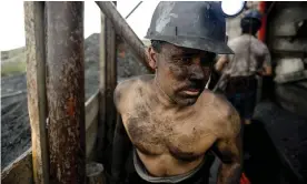  ??  ?? A Mexican miner emerges from a shaft in a coal mine in Agujita, Coahuila state, on 13 November 2012. Photograph: Yuri Cortéz/AFP/Getty Images