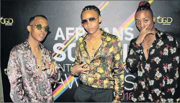  ?? Picture: SUPPLIED ?? IN THE FAST LANE: Asanda Empires artists ARTeast, Kay and Takwana at the African Social Entertainm­ent Awards in Johannesbu­rg at the weekend. Their label scooped best record label award