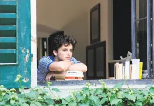  ??  ?? Timothée Chalamet, as Elio, ponders the prime of his life in “Call Me by Your Name.”