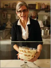  ?? ?? Bobbie Lloyd, chief executive officer of Magnolia Bakery, with her Banana Pudding, made from an instant vanilla pudding mix.