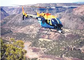  ?? COURTESY OF KRQE ?? KRQE-TV’s helicopter crashed Saturday afternoon in Lincoln County. Pilot Bob Martin was killed in the wreck, police said.