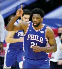  ?? MATT SLOCUM — THE ASSOCIATED PRESS ?? The Sixers’ Joel Embiid celebrates after scoring a basket against the Indiana Pacers Monday night.