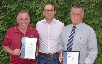  ?? Photo: Contribute­d ?? IMPRESSIVE RUN: Member for Toowoomba South David Janetzki thanks Justices of the Peace Charles Clarke (left) and Bill Smith (right) for their decades of service.