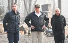  ?? Saul Loeb / AFP / Getty Images 2018 ?? Current Gov. Gavin Newsom (left), President Trump and thenGov. Jerry Brown view fire damage in Butte County last year.