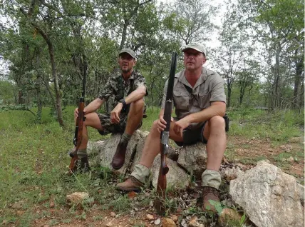  ??  ?? The author (left) and Christo Joubert of Chivic African Safaris taking a break on day one of the hunt.