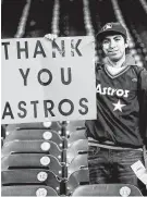  ?? Brett Coomer / Staff photograph­er ?? An Astros fan waits around in the stands after the team lost Game 7 of the World Series at Minute Maid Park on Wednesday night.