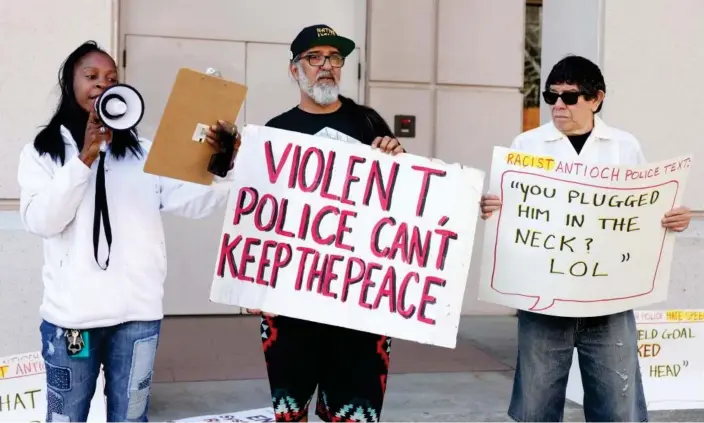  ?? ?? Multiple officers were arrested for sharing violently racist, misogynist and anti-gay texts. Photograph: Ray Chavez/AP