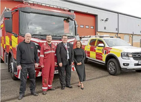 ?? ?? TRAINING: Scottish Fire and Rescue Service technician­s Ron Davies and Ryan Mcleod, Scottish Fire and Rescue Services fleet manager Scott Roberts and Caryn Gibson of Dundee and Angus College.