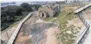  ??  ?? ALL ANGLES: The new boardwalk encircles the historic church ruins