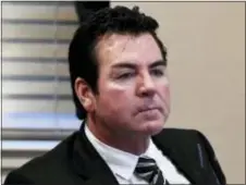  ?? TIMOTHY D. EASLEY — THE ASSOCIATED PRESS FILE ?? Papa John’s founder and CEO John Schnatter attends a meeting in Louisville, Ky. Schnatter, who appears on the chain’s commercial­s and pizza boxes, will leave the CEO role in January 2018, weeks after he publicly criticized NFL leadership for the...