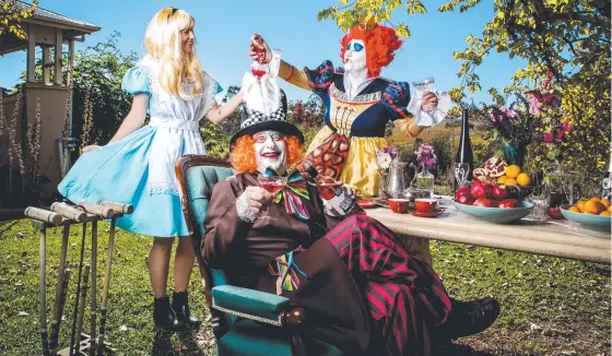  ?? ?? Jemma Ashby as Alice, Warrick Duthy as the White Rabbit and Nicola Palmer as the Queen of Hearts. Picture: Matt Turner