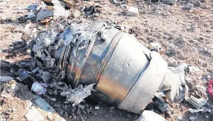  ?? REUTERS ?? General view of the debris of the Ukraine Internatio­nal Airlines, flight PS752, Boeing 737-800 plane that crashed after take-off from Iran’s Imam Khomeini airport, on the outskirts of Tehran, Iran on Jan. 8.