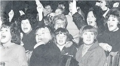  ??  ?? RECOGNISE ANYONE?: Fans pictured when The Beatles came to Hull in November 1963.