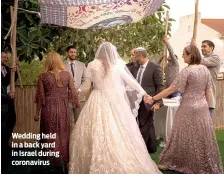  ?? PHOTO: LAURA BEN DAVID ?? Wedding held in a back yard in Israel during coronaviru­s