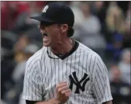  ?? JULIE JACOBSON — THE ASSOCIATED PRESS ?? New York Yankees pitcher Tyler Clippard reacts after striking out St. Louis Cardinals left fielder Randal Grichuk with two men on base to end the baseball game, Saturday in New York. The Yankees won 3-2.