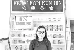  ??  ?? Mazrinah at Kedai Kopi Kun Hin insists customers step outside to smoke.