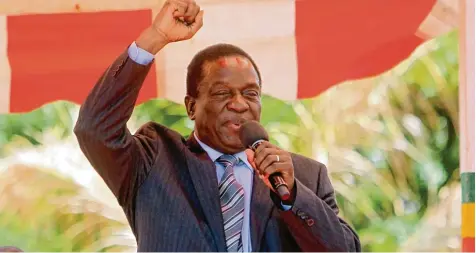  ?? Foto: Tsvangiray­i Mukwazhi, dpa ?? „Krokodil“heißt sein Spitzname: Emmerson Mnangagwa will Präsident von Simbabwe werden.