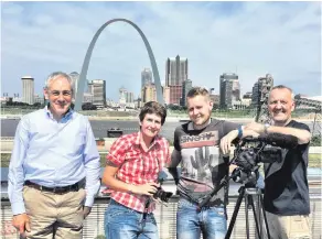  ??  ?? Former MLA Alan McFarland and filmmaker Michael Beattie (far right) with sound recordist Christine Barker and cameraman Matt Gould at the St Louis Gateway Arch, the site of Robert Campbell’s first premises. Right: The Campbell family memorial in St Louis