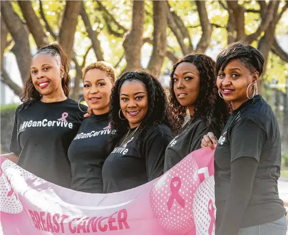  ?? Mark Mulligan / Staff photograph­er ?? Top: Franz Battle, from left, Chivon Jones, DaNetra Brantley, LaTasha Ford and Sherese Guy are all breast cancer survivors. Above: Brantley took part in a photo shoot in which words representi­ng her cancer journey were written across her skin.