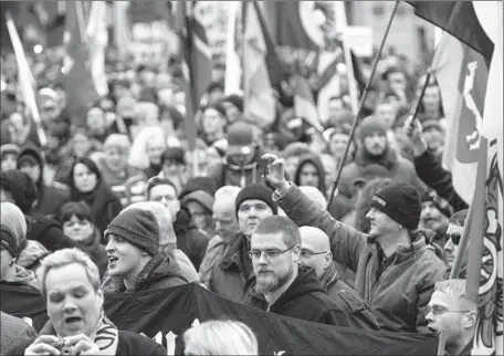  ?? Carsten Koall
Getty I mages ?? MARCHERS opposed to Chancellor Angela Merkel’s open- door refugee policy rally in Berlin. The Alternativ­e for Germany party, which has campaigned hard against that policy, has surged in polling from 3% last year to as high as 20% leading up to Sunday’s...