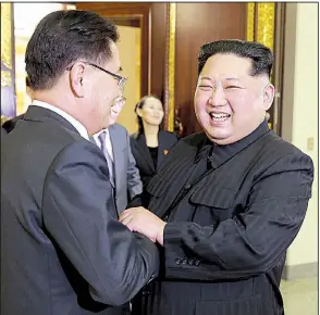  ?? AP/Korean Central News Agency/Korea News Service ?? Chung Eui-yong (left), South Korea’s national security director, meets Monday with North Korean leader Kim Jong Un in Pyongyang, North Korea. Kim’s sister, Kim Yo Jong, is in the background.