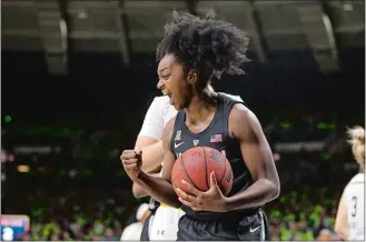  ?? ROBERT FRANKLIN/AP PHOTO ?? UConn’s Christyn Williams (13) celebrates during the first half of Sunday’s game against Notre Dame at South Bend, Ind. Williams scored 28 points as UConn won 89-71.