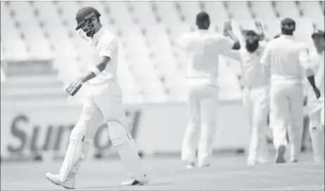  ??  ?? India’s Virat Kohli leaves the pitch after being dismissed by South Africa’s Lungi Ngidi. (Reuters photo)