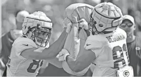  ?? DAN POWERS/USA TODAY NETWORK-WISCONSIN ?? Green Bay Packers tight ends Tyler Davis (84) and Josiah Deguara perform a drill during training camp.