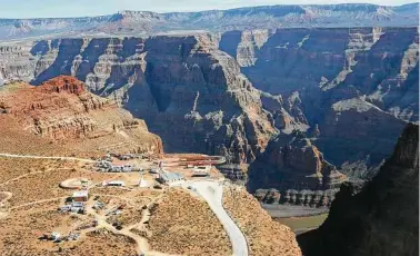  ?? Associated Press file photo ?? A skywalk over the Grand Canyon offers a grand view. Be aware of the selfie danger at such sites.