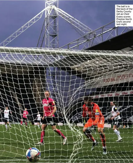  ??  ?? The ball is in the back of the Derby County net as Ched Evans scores Preston North End’s second last night.