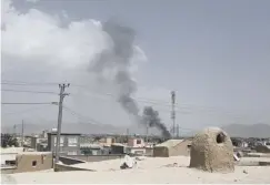  ??  ?? Smoke rises after the attack on the provincial capital of Ghazni