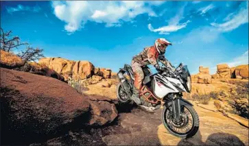  ?? KTM ?? THE KTM 1090 Adventure R performs splendidly on dirt and is surprising­ly compliant on pavement. The bike also comes in a larger-displaceme­nt 1290 version, as well as a non-R model more suited for the streets.