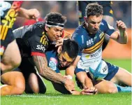  ?? Photo / Getty Images ?? Nic White of the Brumbies tries to secure the ball during the round 12 Super Rugby Pacific match between the Chiefs and the ACT Brumbies on Saturday.