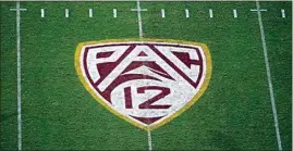  ?? RALPH FRESO / AP ?? This file photo shows the PAC-12 logo at Arizona State’s Sun Devil Stadium. Five of the 12 schools in the Pac-12 expect to reopen their campuses this fall, a key step to the return of college sports. Both Arizona schools, both Washington schools and Oregon anticipate holding in-person classes in the fall, but that leaves seven others — including UCLA and USC — still mulling whether to follow suit or continue holding online classes.