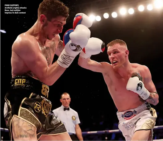  ?? Photos: LAWRENCE LUSTIG/MATCHROOM ?? POOR SUPPORT: Arnfield [right] attacks Rose, but neither impress in dull contest