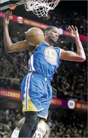  ?? Tony Dejak Associated Press ?? SEEKING HIS FIRST NBA championsh­ip, Kevin Durant came up big again against the Cavaliers.