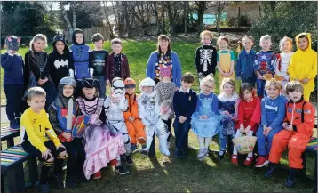  ??  ?? Ms O’Toole Byrne with Senior Infants at World Book Day at St Mary & St Gerard’s NS, Enniskerry.