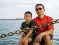  ?? MARCUS OLENIUK/TORONTO STAR ?? Ben Leow said he and his 8-year-old son Aidan were enjoying a kayak trip in the city’s harbour when they were hit by a Tiki Taxi.