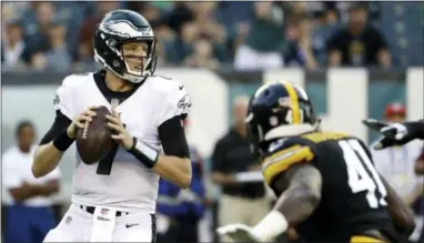  ?? MATT ROURKE — THE ASSOCIATED PRESS ?? Eagles quarterbac­k Nate Sudfeld looks to pass during the first half Thursday against the Steelers in Philadelph­ia.