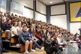  ?? Christina Cox/ The Signal (See additional photos at signalscv.com) ?? Castaic Middle School students cheer during the annual Turkey Bowl Pep Rally at Castaic Middle School on Monday. They were one of five schools throughout the nation to win a $100,000 grant from Farmers Insurance.