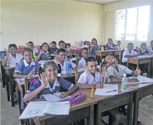  ?? Photo: Karalaini Tavi ?? Students of Vunisamalo­a Sangam School in Korovuto, Ba, in their new school block on January 25, 2018.