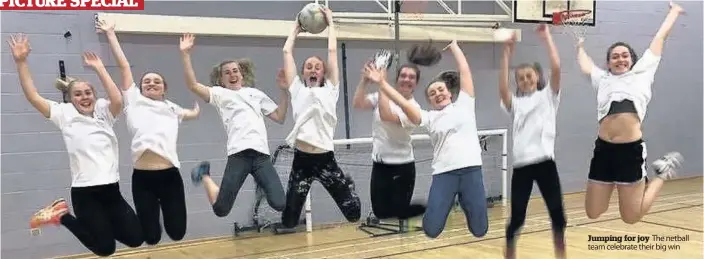  ??  ?? Jumping for joy The netball team celebrate their big win