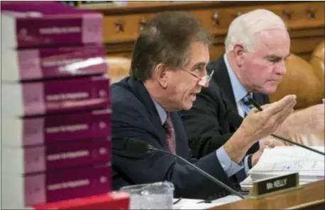  ?? ASSOCIATED PRESS ?? Rep. Jim Renacci, R-Ohio, joined at right by Rep. Pat Meehan, R-7 of Chadds Ford, makes a point as the House Ways and Means Committee continues its debate over the Republican tax reform package on Capitol Hill on Wednesday.