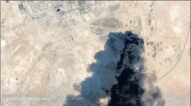  ?? REUTERS ?? A satellite image shows an apparent drone strike on an Aramco facility in Saudi Arabia.