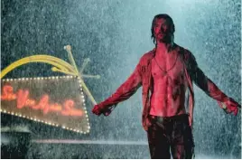  ?? 20TH CENTURY FOX ?? Chris Hemsworth, one of the many big names in the lurid period piece “Bad Times at the El Royale,” plays a cult leader named Billy Lee.