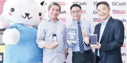  ??  ?? (From Left) GCat, official mascot of GCash, Mynt Vice President for Business Developmen­t Luigi Reyes, Alfamart Philippine­s’ COO Harvey Ong and President Robert Kwee showing their GCash Mobile App and the official QR Code for Alfamart.