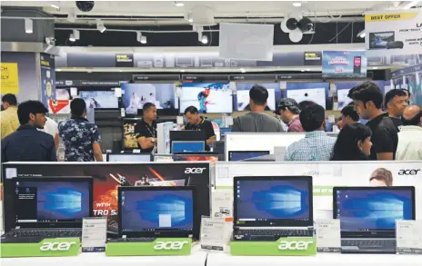  ?? Getty ?? Acer says consumer business is flat as demand for personal computers continues to decline