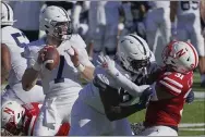  ?? THE ASSOCIATED PRESS ?? Penn State quarterbac­k Will Levis completes 14-of-31 passes for 219 yards and rushes 18 times for 61 yards in the Nittany Lions’ loss to Nebraska.