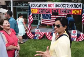  ?? ANDREW CABALLERO-REYNOLDS/AFP VIA GETTY IMAGES ?? A June 12, 2021 rally in Leesburg, Virginia, against “critical race theory” which participan­ts wrongly believe is being taught in schools.